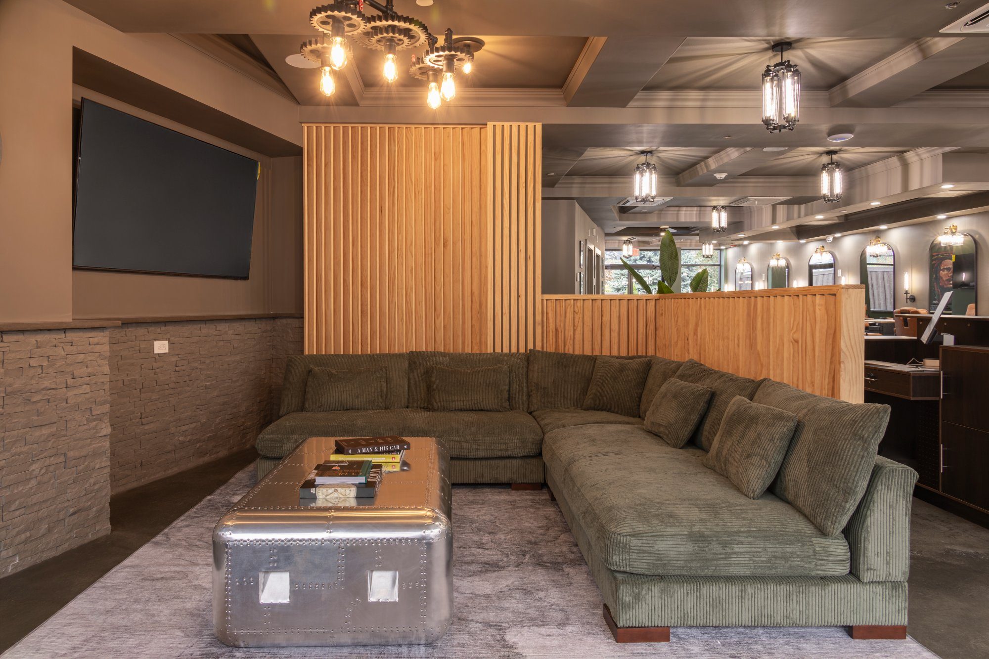 Interior of Legendary Men's Grooming barbershop in White Plains NY — modern lounge area